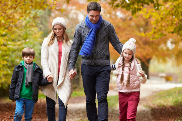 Family enjoying a fall walk